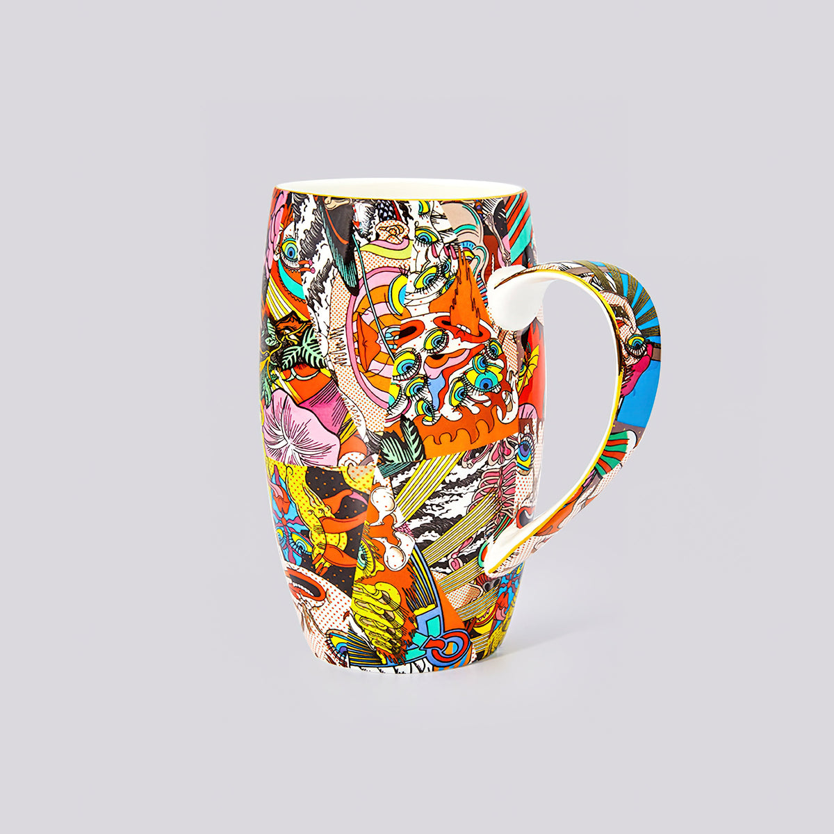 A ceramic mug featuring a highly detailed, colorful pop-art style illustration with a gold-trimmed rim and a curved handle, set against a solid light gray background.